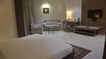 Deluxe Room | Minibar, in-room safe, individually decorated, rollaway beds