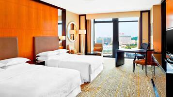 Premium bedding, down duvets, Select Comfort beds, minibar