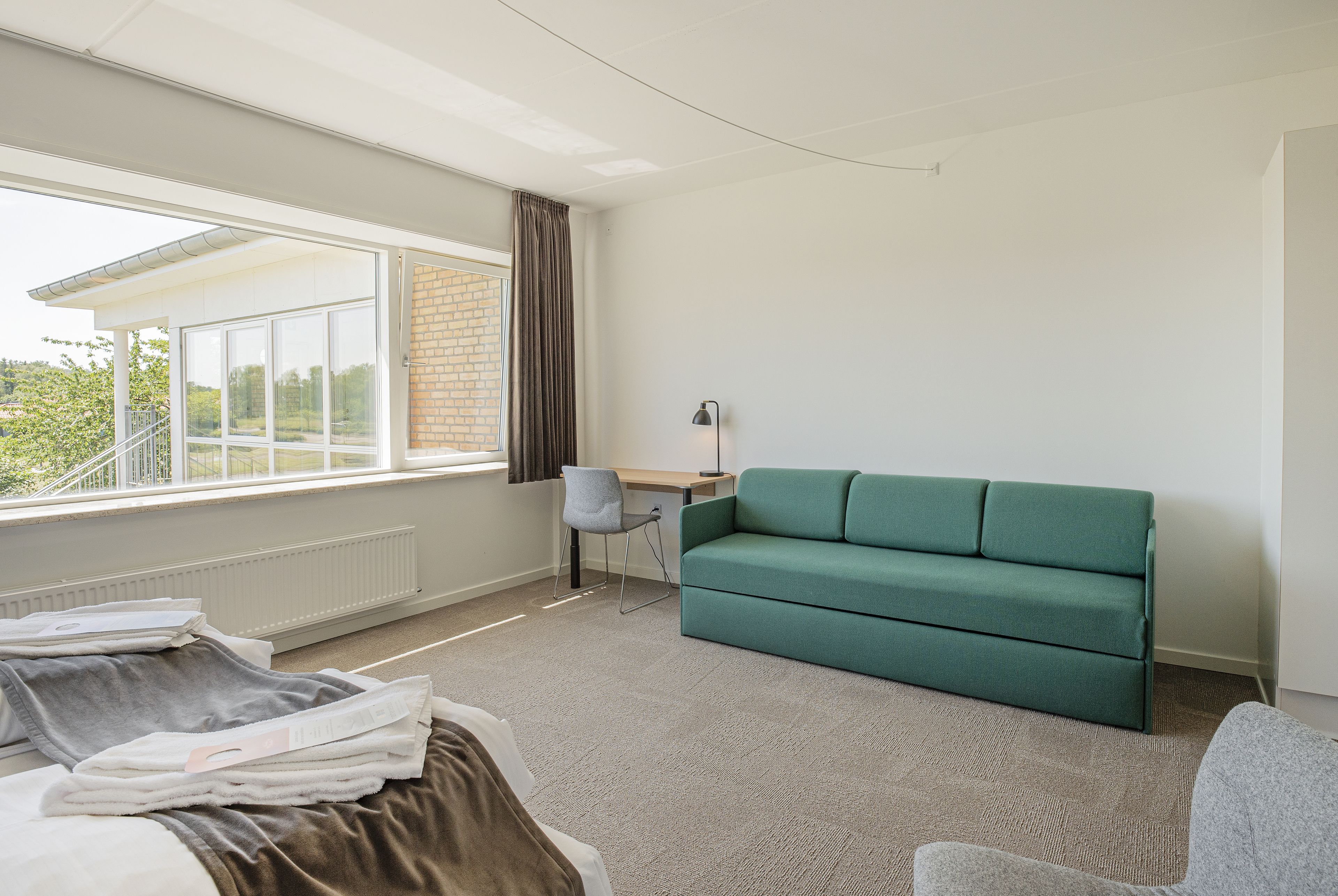 Firemannsrom – comfort | Oppholdsområde | En 26-tommers Flatskjerm-TV med kabel-kanaler samt TV