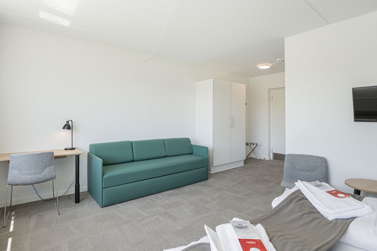 Comfort-Vierbettzimmer | Hochwertige Bettwaren, Pillowtop-Betten, individuell dekoriert