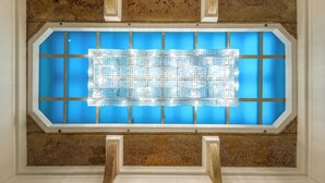 A room with a large, rectangular stained glass window. - Hotel President Budapest, Affiliated by Meliá (Budapest)