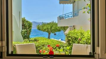 Standard Studio, Partial Sea View, Ground Floor | 1 bedroom, premium bedding, in-room safe, individually decorated