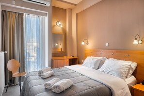Minibar, bureau, rideaux d’obscurcissement, système d’insonorisation