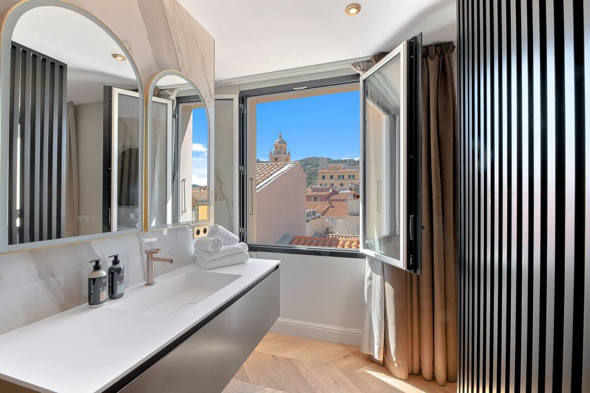 luxury penthouse | bathroom | shower, free toiletries, hair dryer, bathrobes