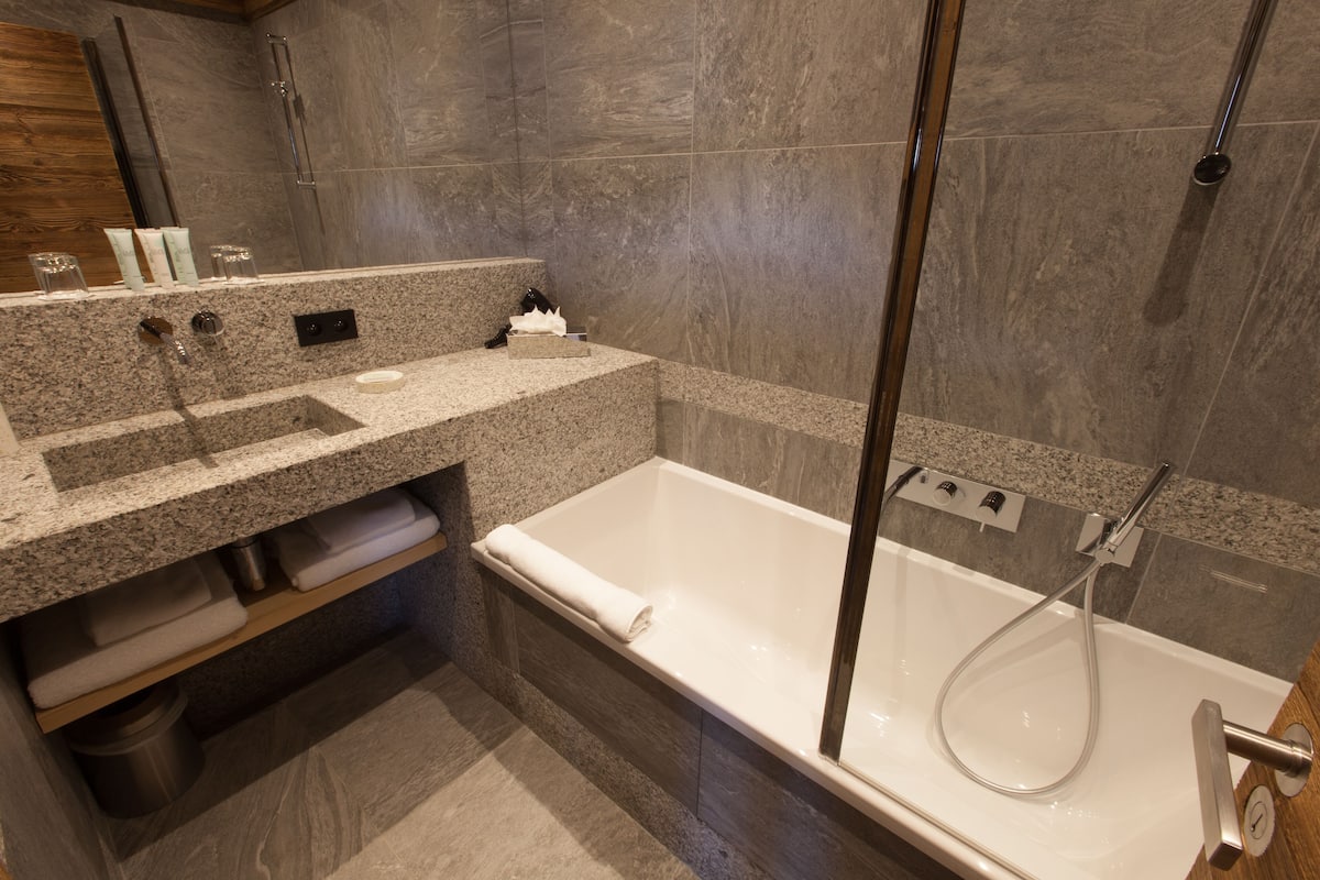 junior suite | bathroom amenities | free toiletries, hair dryer, bathrobes, slippers