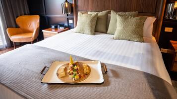 Premium bedding, minibar, blackout curtains, iron/ironing board