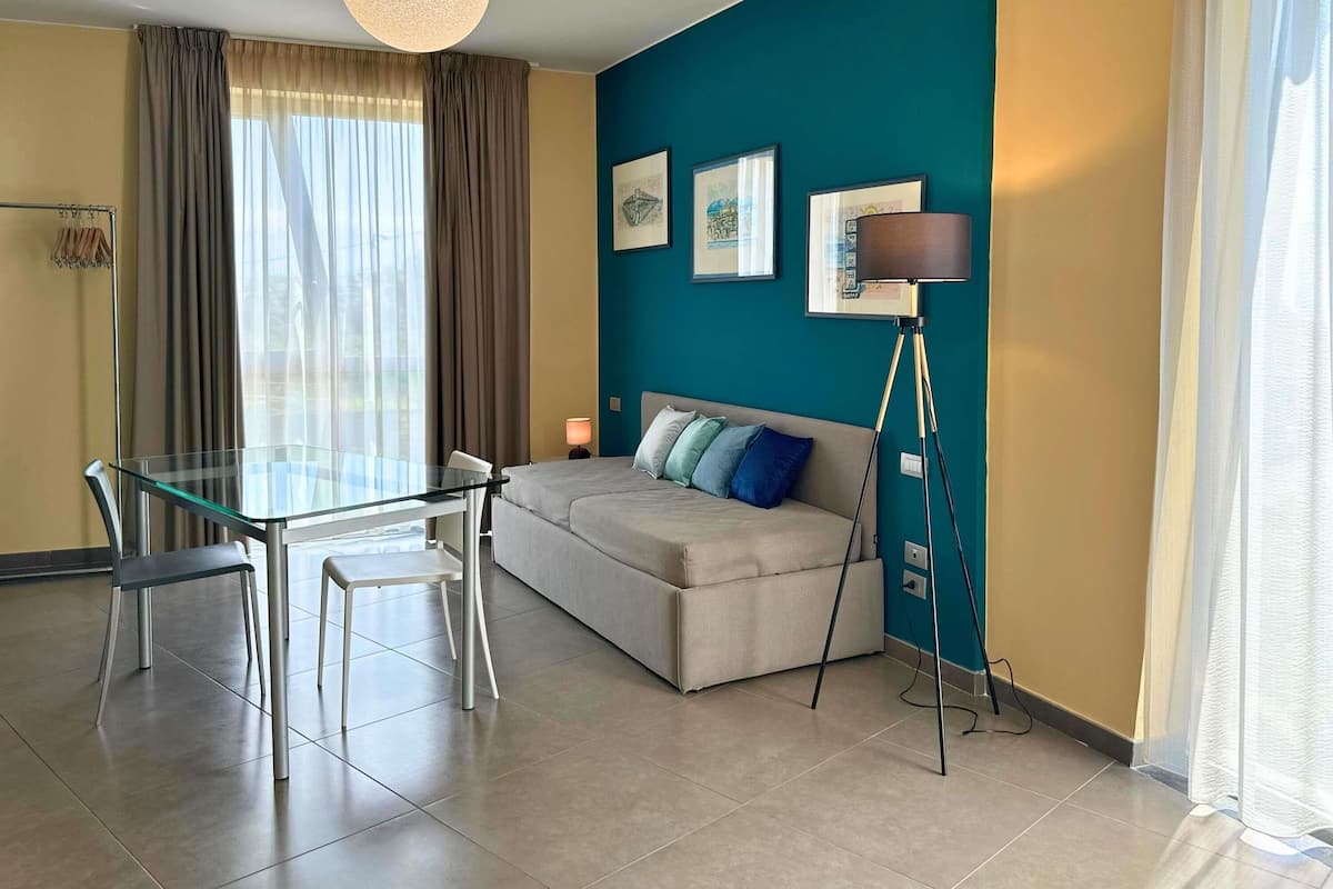 Suite Deluxe, 2 llits dobles | Roba de llit d'alta qualitat i cobrellits