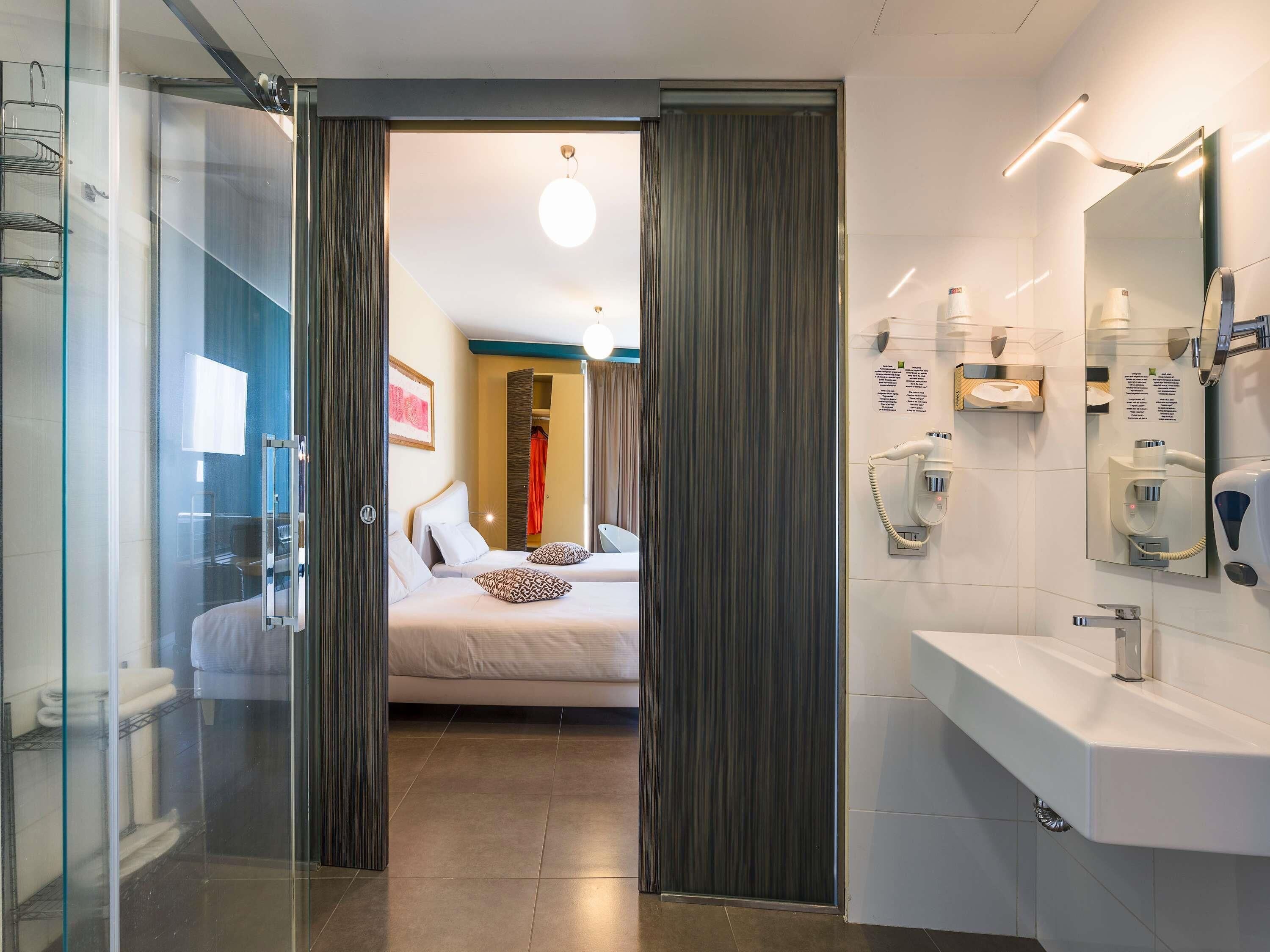 Premium bedding, down comforters, minibar, in-room safe