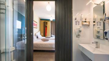 Premium bedding, down comforters, minibar, in-room safe