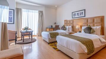 Premium bedding, pillowtop beds, minibar, in-room safe