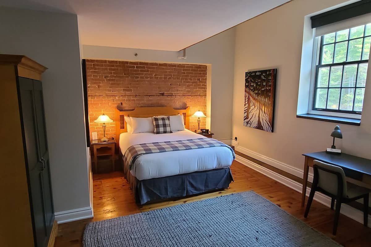 standard room waterfall view (heritage - queen) | hypo-allergenic bedding, select comfort beds, individually decorated