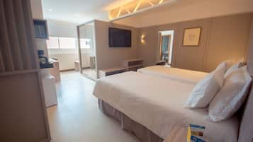 Suíte Master | Frigobar, cofres nos quartos, escrivaninha, cortinas blackout
