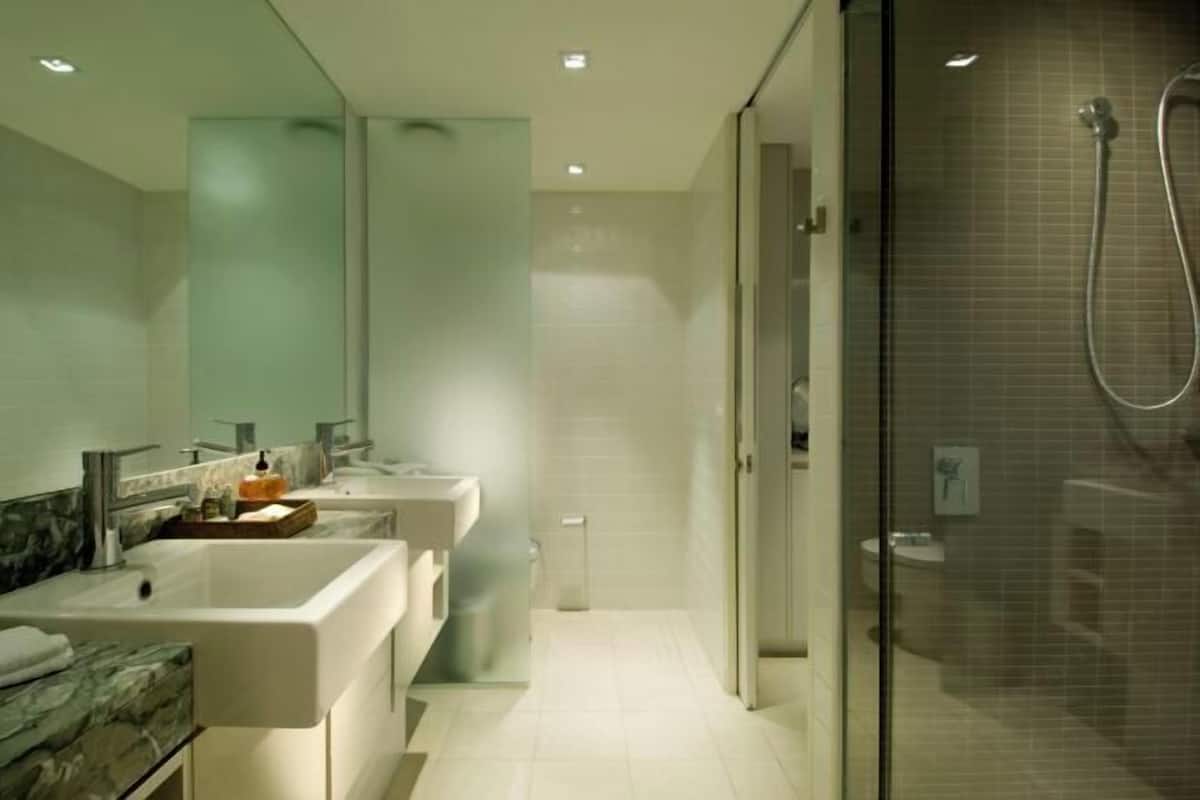 Separate tub and shower, jetted tub, designer toiletries, hair dryer