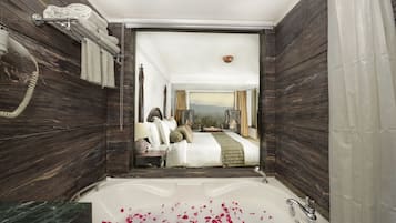 Royal Suite, Bathtub, River View | Bathroom | Designer toiletries, hair dryer, slippers, towels