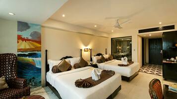 A hotel room with two beds, a dining table, a chair, and a painting on the wall.