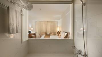 Separate tub and shower, free toiletries, hair dryer, bathrobes