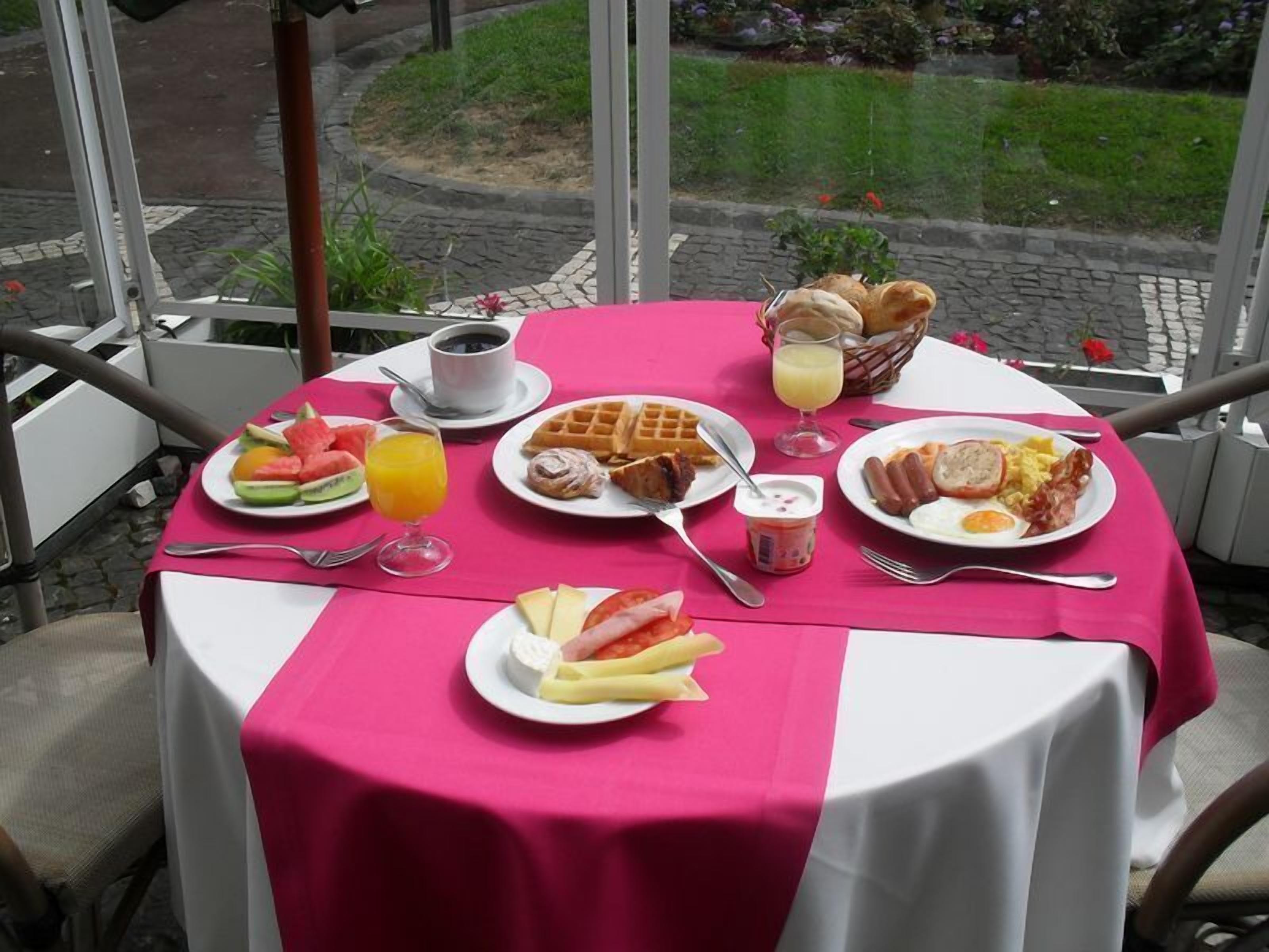 breakfast, lunch, dinner served; garden views