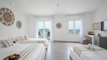 Deluxe Quadruple Room, 1 Bedroom, Sea View, Sea Facing | Premium bedding, in-room safe, desk, laptop workspace