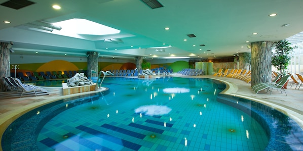 Indoor pool, outdoor pool, pool umbrellas, sun loungers