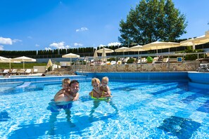 Indoor pool, outdoor pool, pool umbrellas, sun loungers