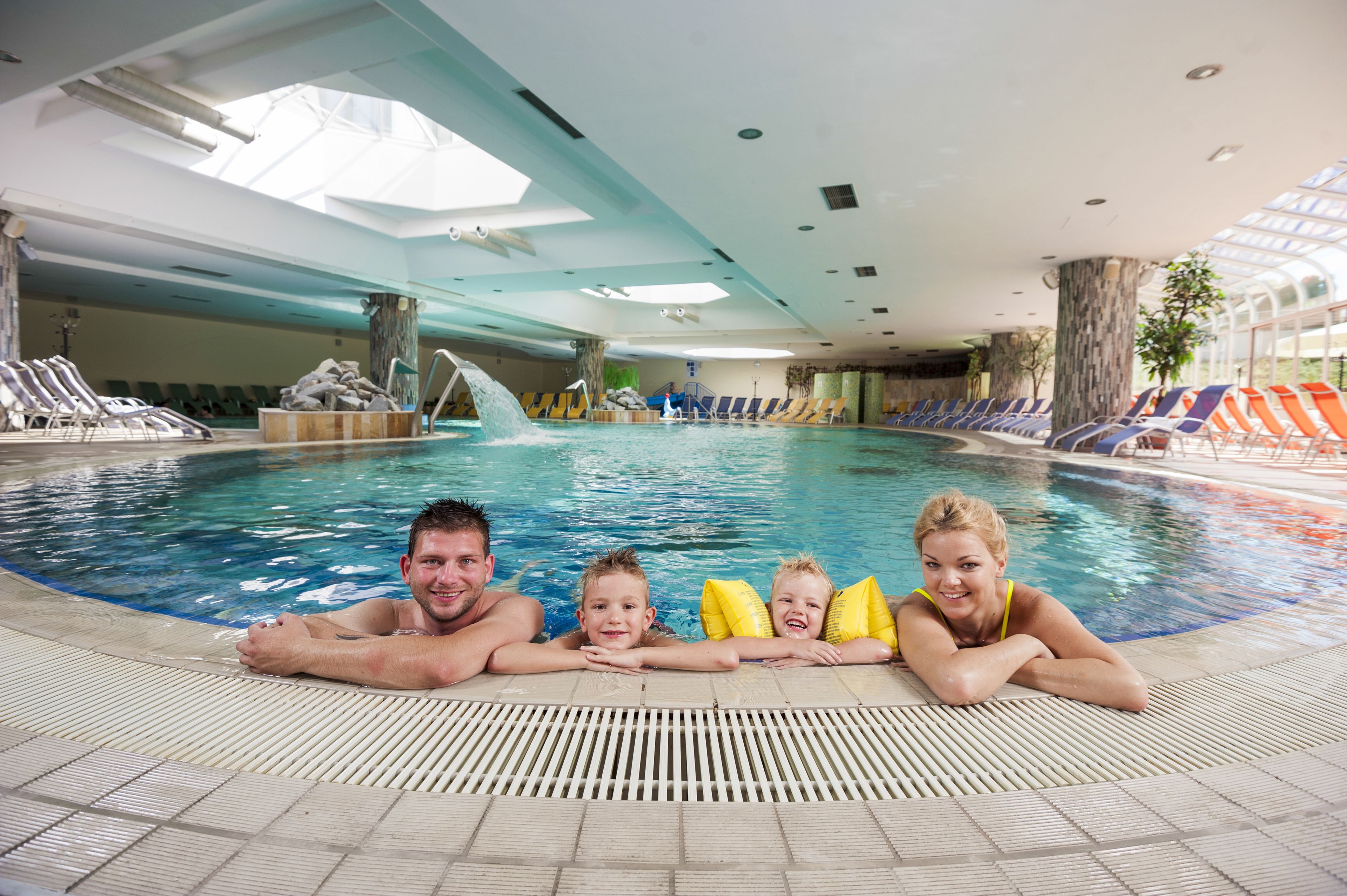 Indoor pool, outdoor pool, pool umbrellas, pool loungers