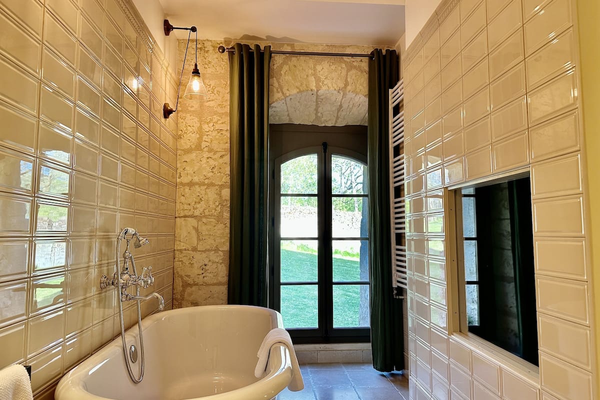 deluxe double room | bathroom | designer toiletries, hair dryer, towels, soap