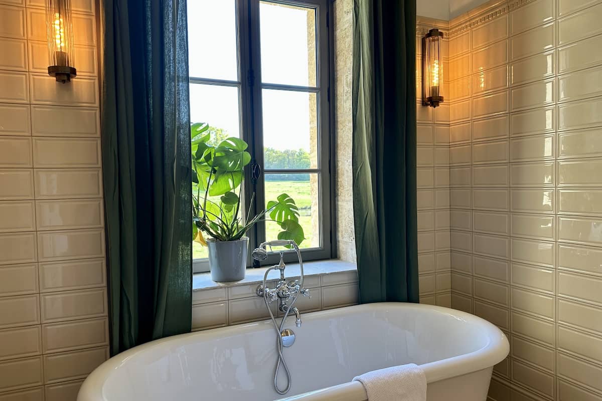 deluxe double room | bathroom | designer toiletries, hair dryer, towels, soap