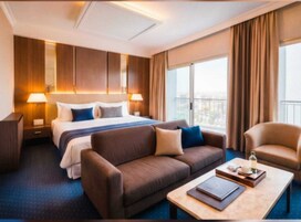 Suite junior | Ropa de cama hipoalergénica, minibar, caja fuerte y escritorio