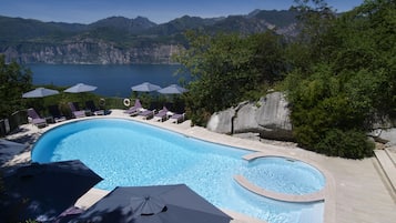 Outdoor pool, open 9:30 AM to 7:30 PM, pool umbrellas, pool loungers