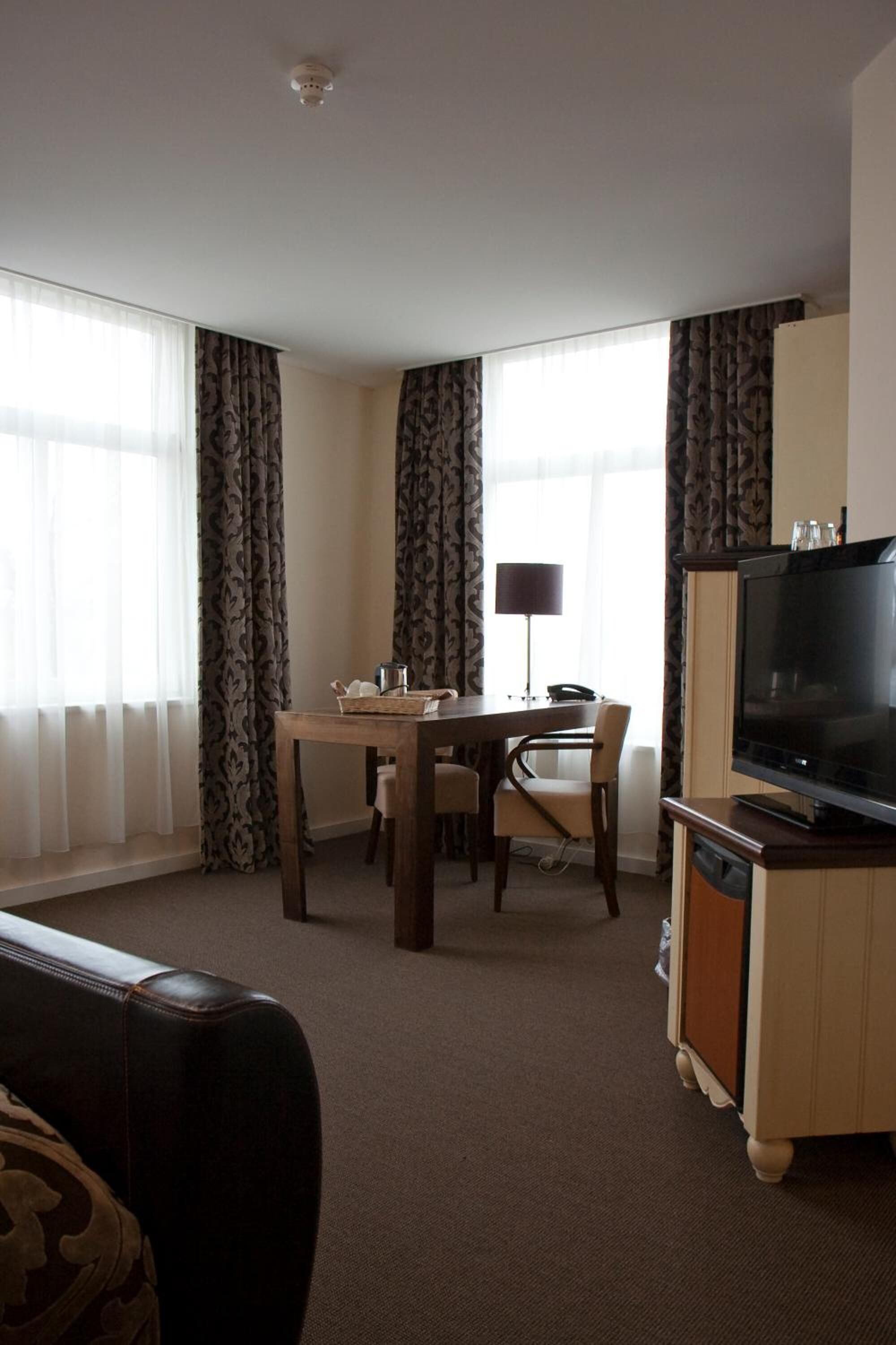 executive double room, bathtub | in-room safe, desk, blackout curtains, iron/ironing board