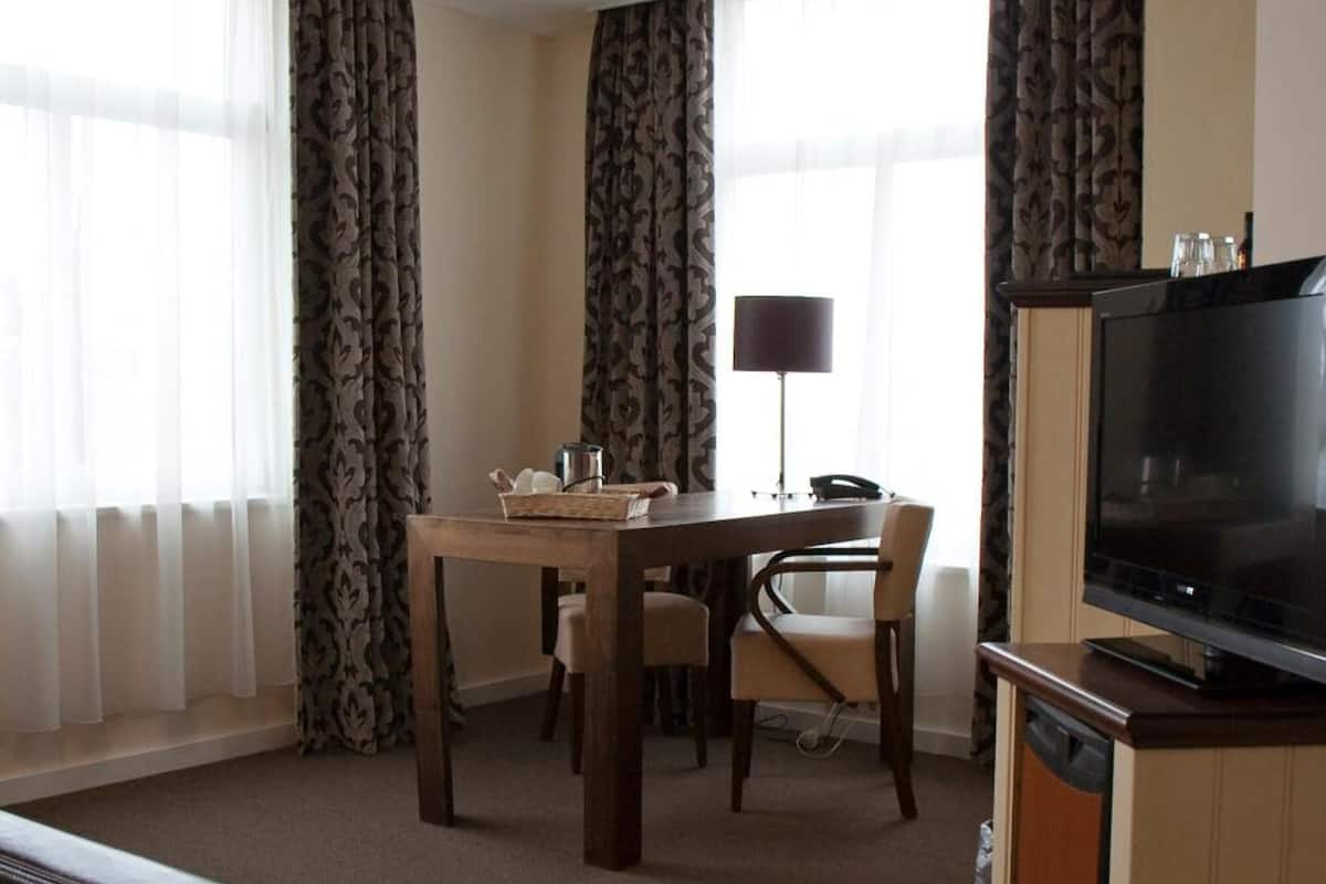 executive double room, bathtub | in-room safe, desk, blackout curtains, iron/ironing board