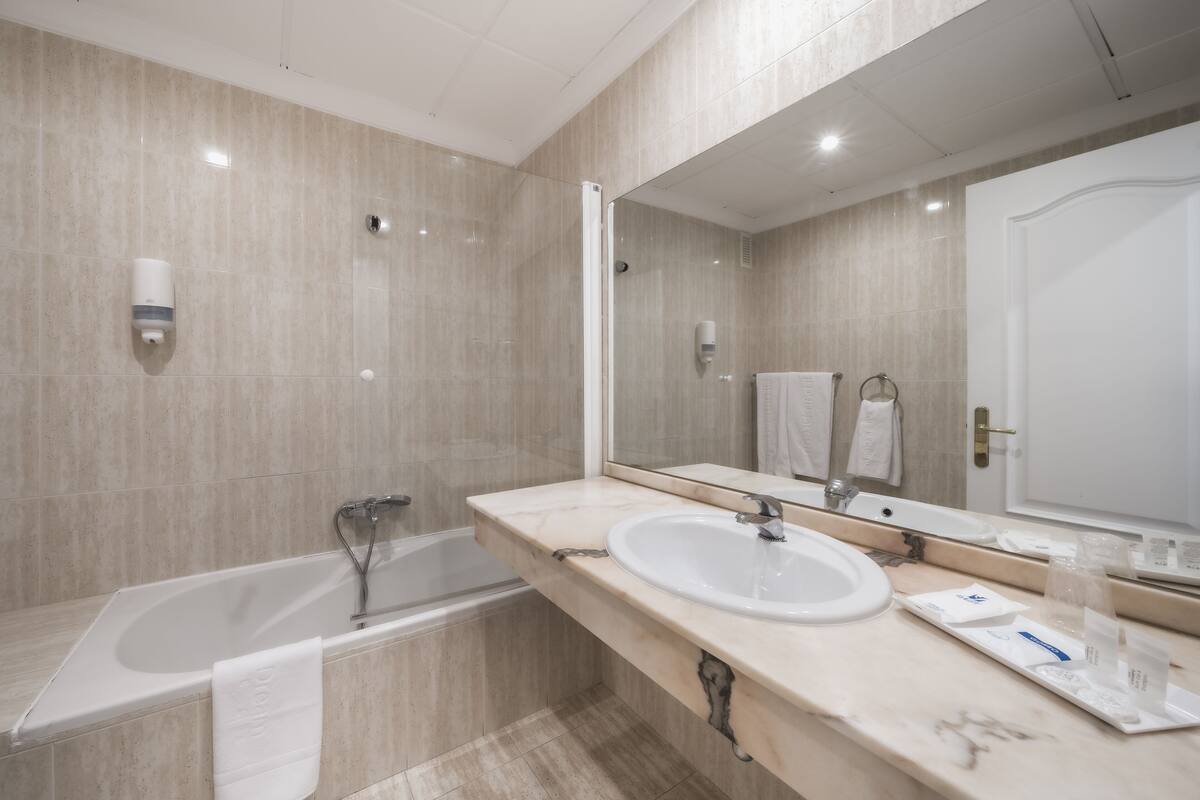 free toiletries, hair dryer, bidet, towels