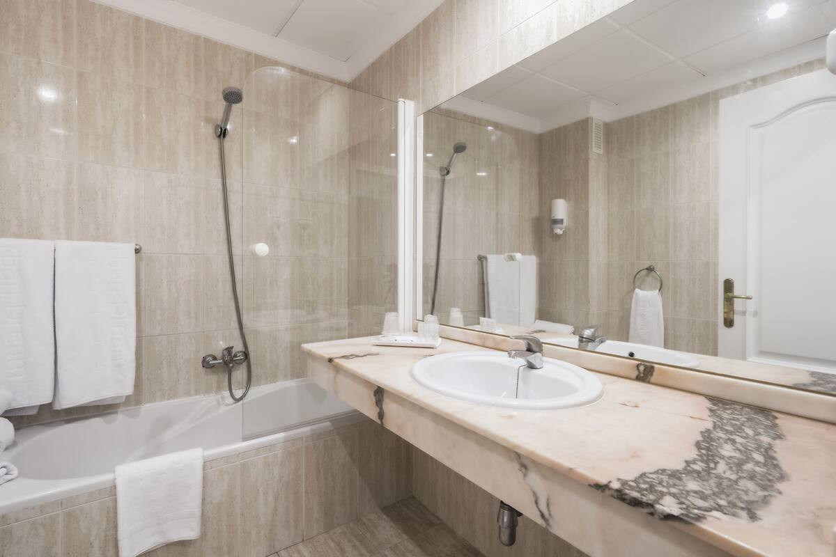 free toiletries, hair dryer, bidet, towels