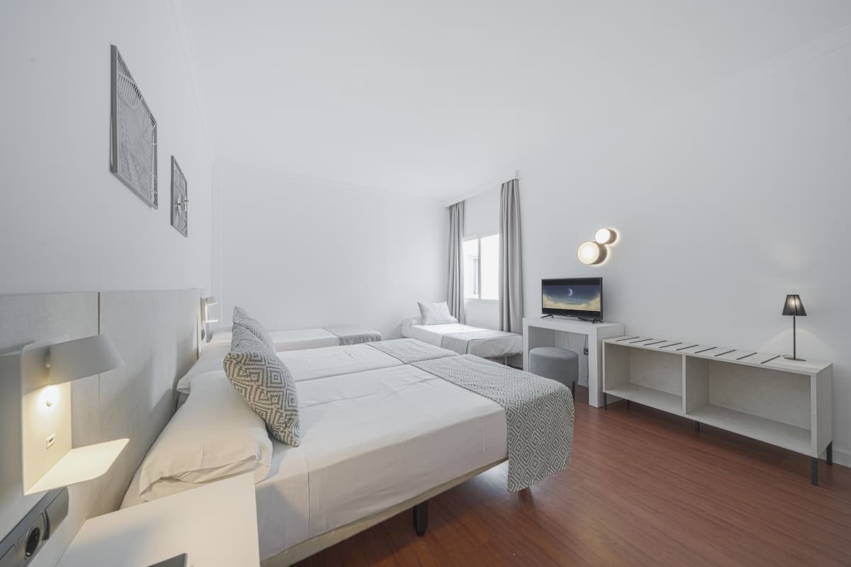 double room with 2 rollaway beds | desk, blackout curtains, rollaway beds, free wifi