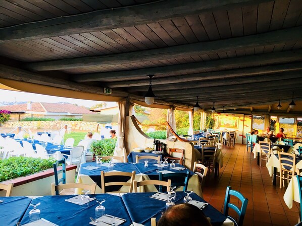 Dinner served, seafood, garden views