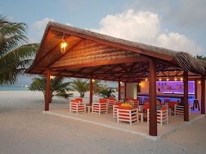 Beach views, serves happy hour