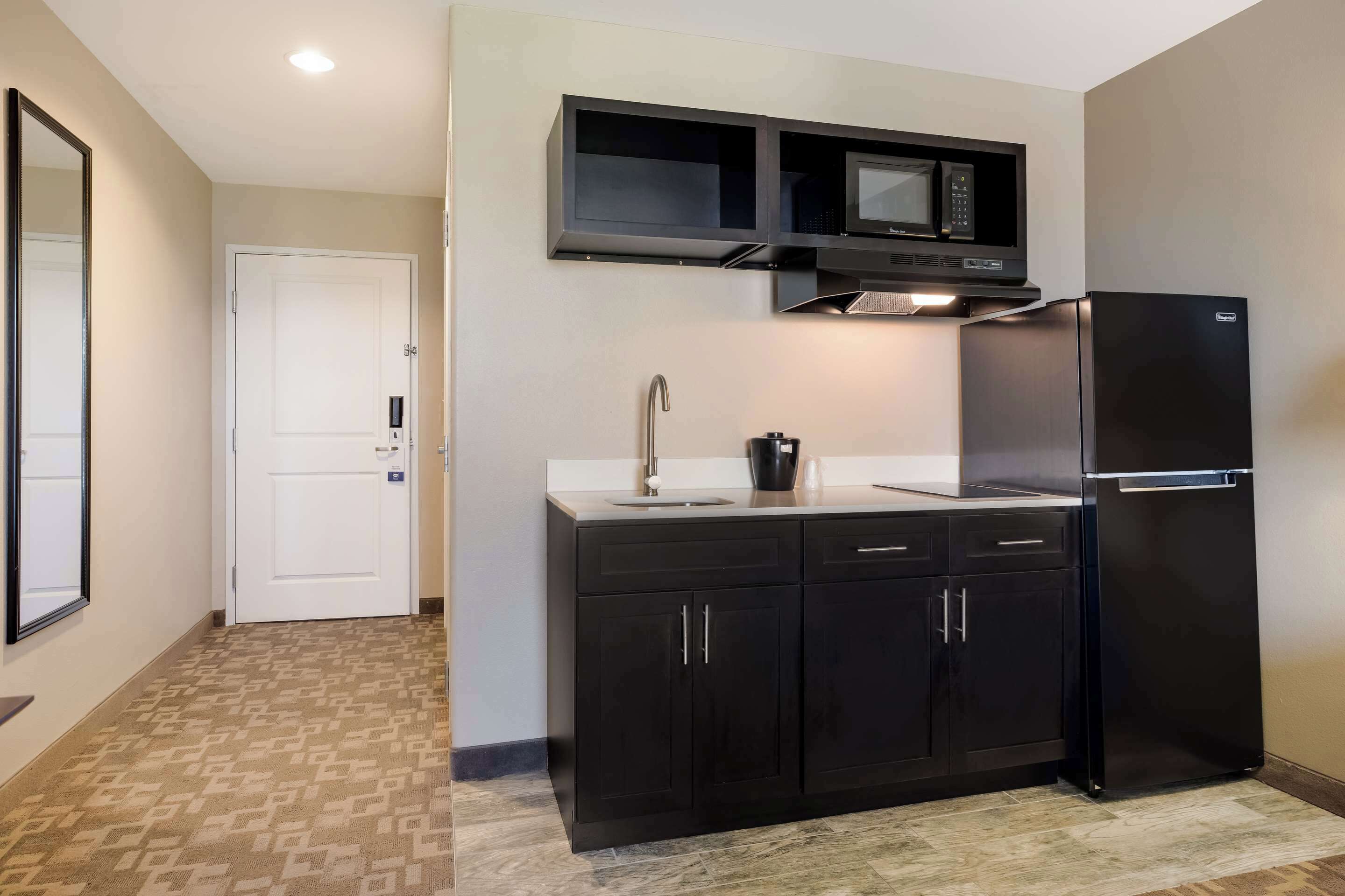 individually furnished, desk, laptop workspace, iron/ironing board