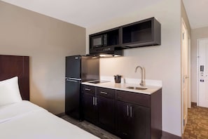 Individually furnished, desk, laptop workspace, iron/ironing board