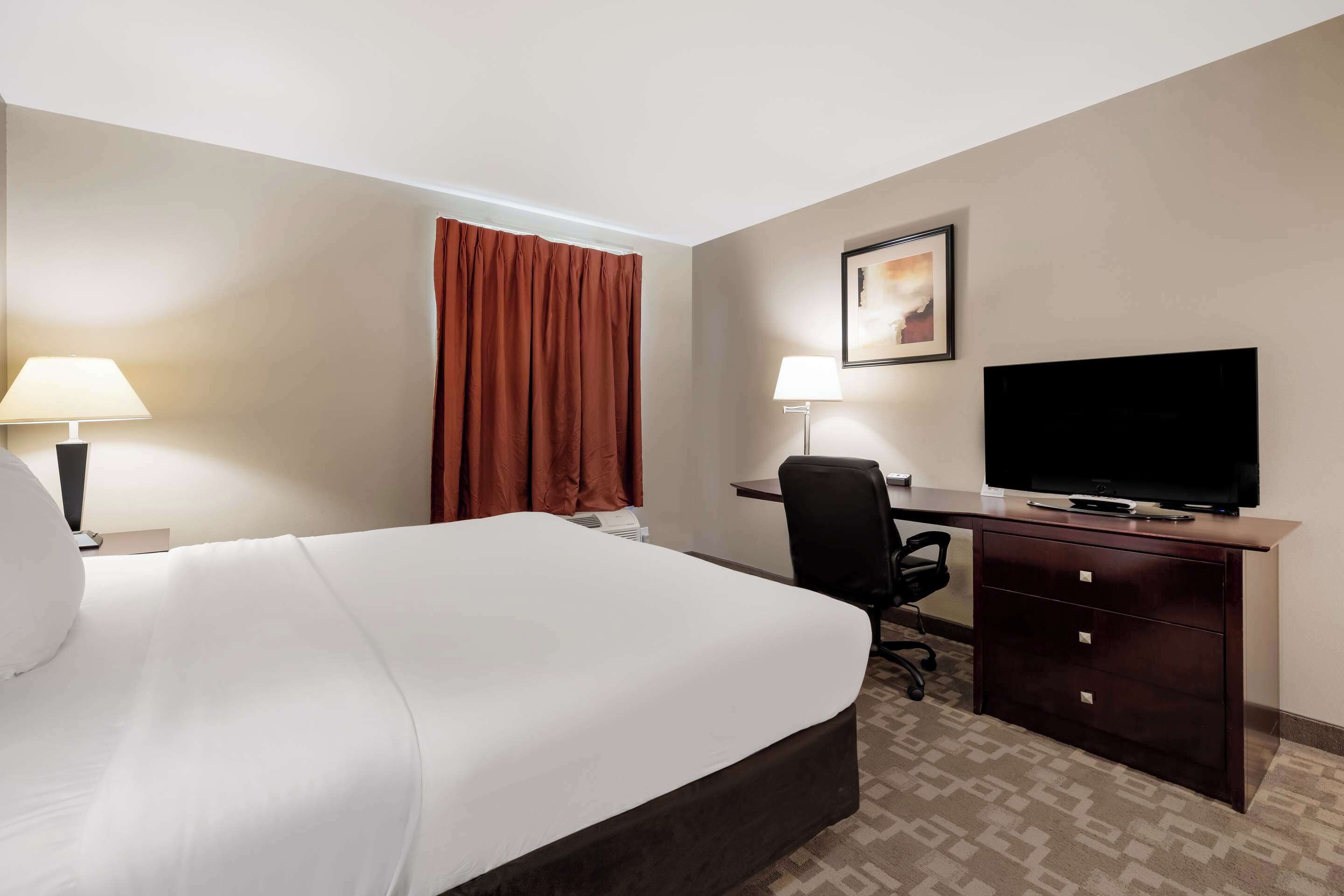 individually furnished, desk, laptop workspace, iron/ironing board