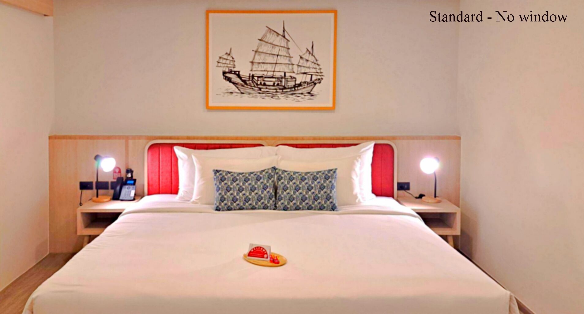 Rom – standard, ingen vinduer | Safe på rommet, individuelt dekorert, individuelt innredet og skrivebord