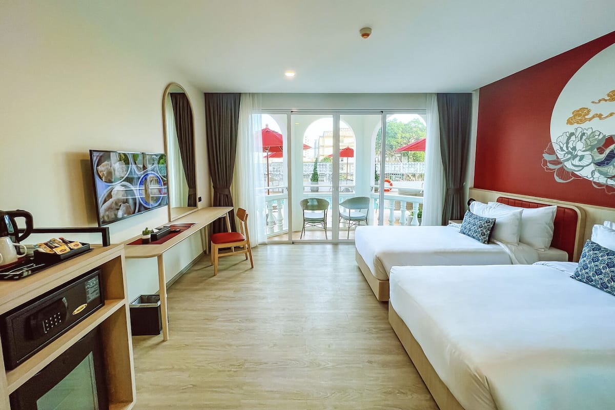 Deluxe Twin kamer, balkon | Een kluis op de kamer, individueel gedecoreerd, individueel gemeubileerd