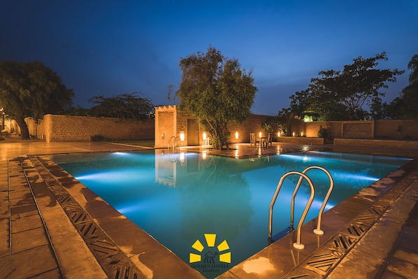 Outdoor pool, open 7:30 AM to 6:30 PM, pool umbrellas, pool loungers