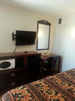 Quarto standard, 1 cama King | Individualmente mobiliados, escrivaninha, cortinas blackout