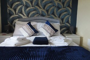 Blackout curtains, iron/ironing board, free WiFi, bed sheets
