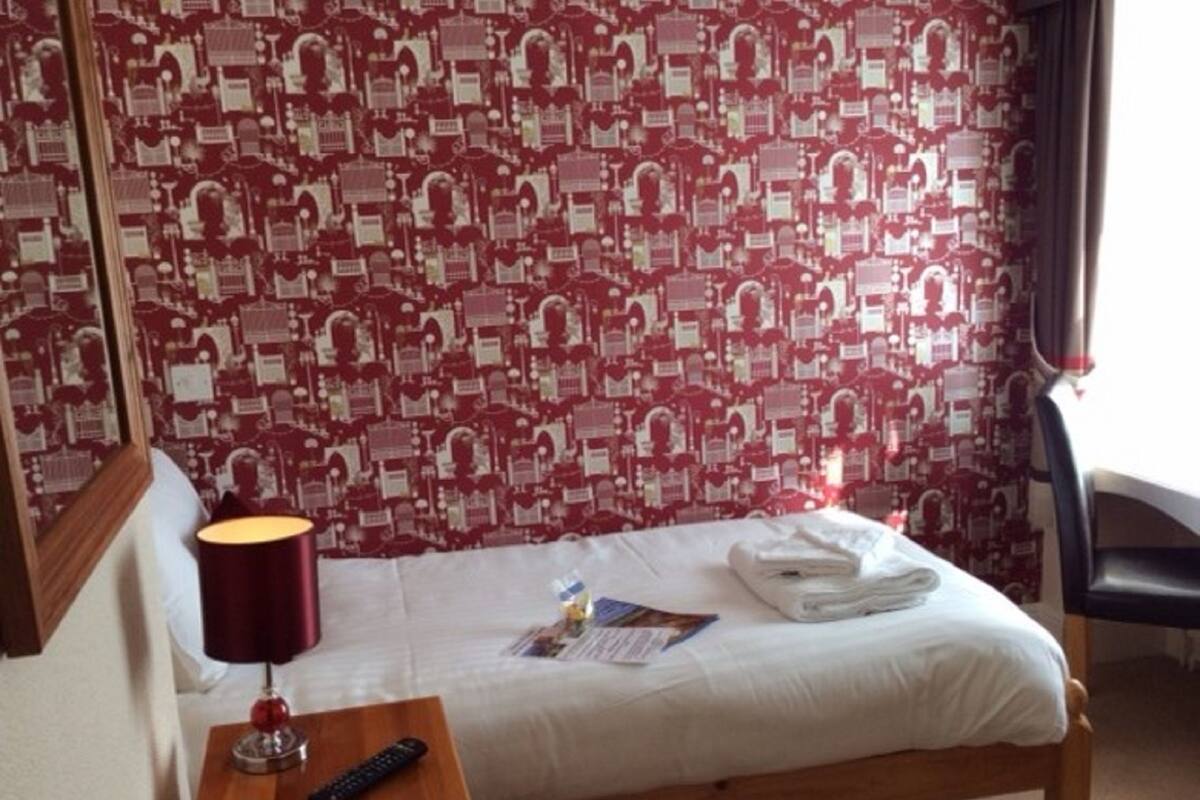 Blackout curtains, iron/ironing board, free WiFi, bed sheets