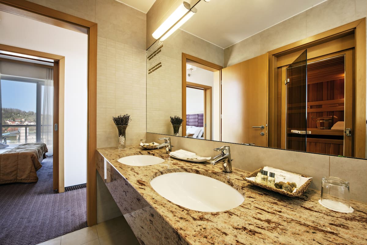 presidential suite, balcony | bathroom | hair dryer, towels