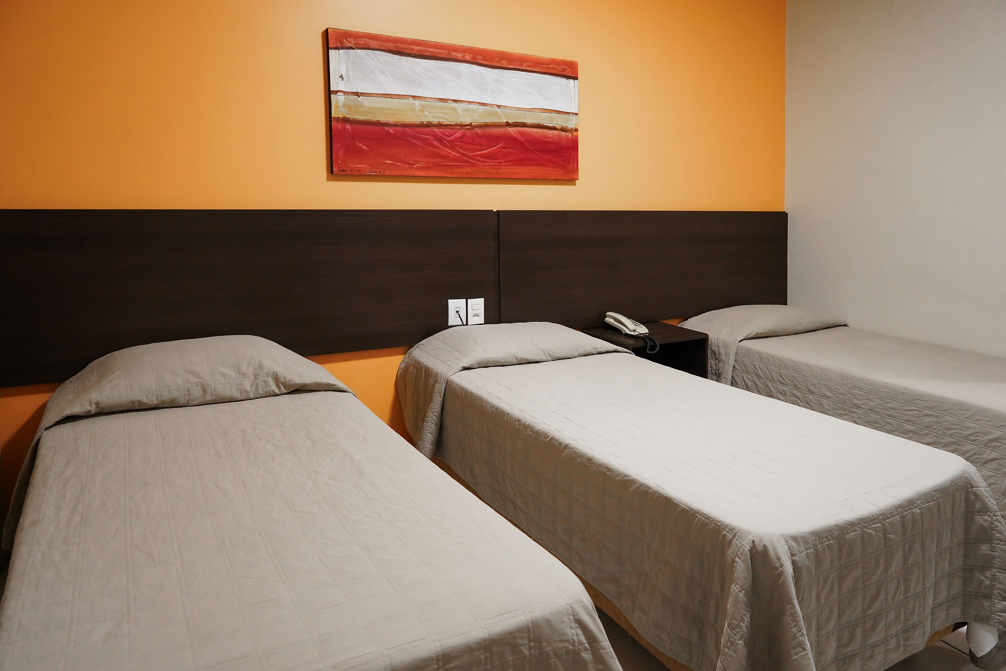 luxury triple room | minibar, individually decorated, desk, cots/infant beds