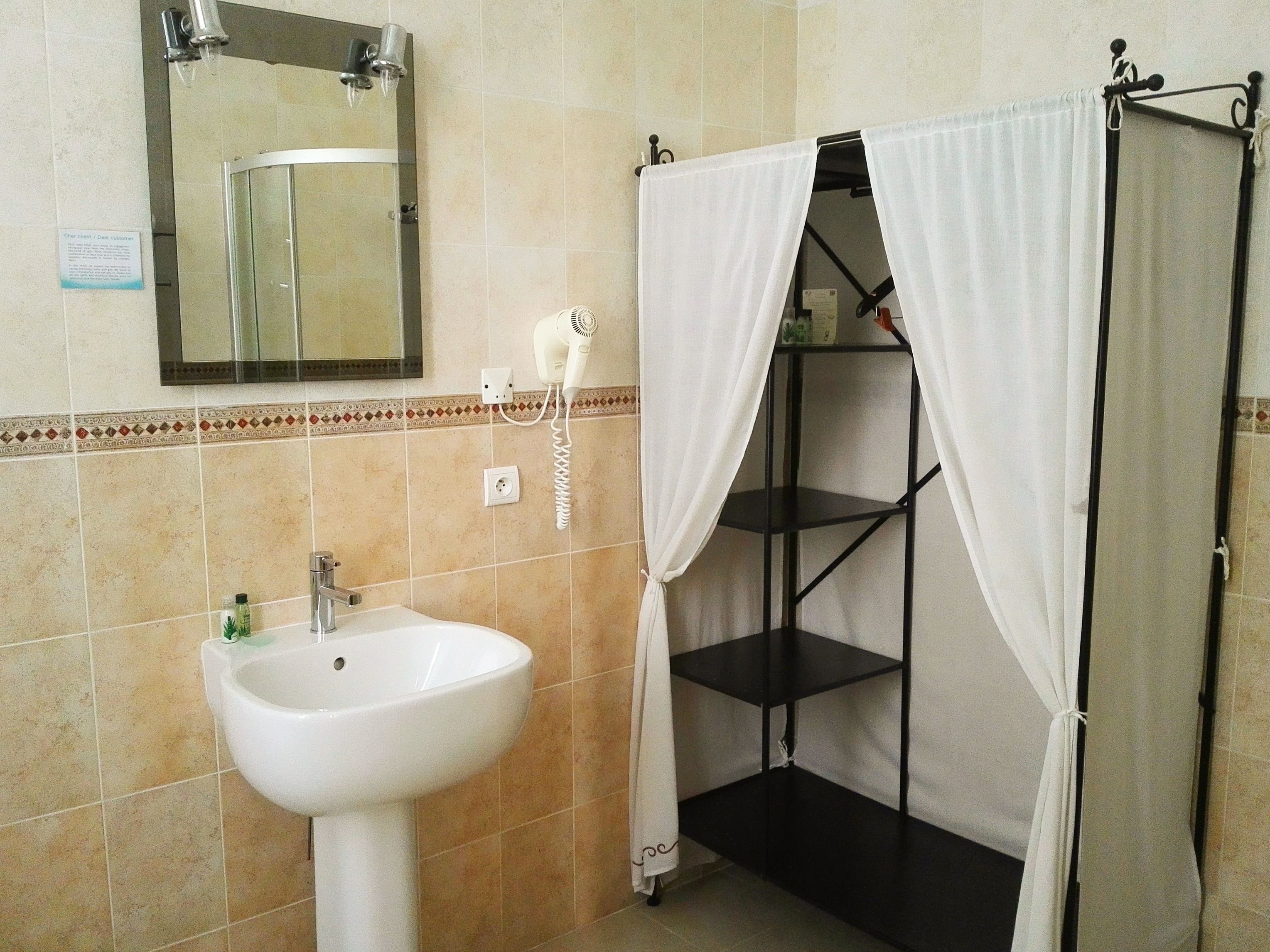 quadruple room | bathroom | shower, hair dryer, towels