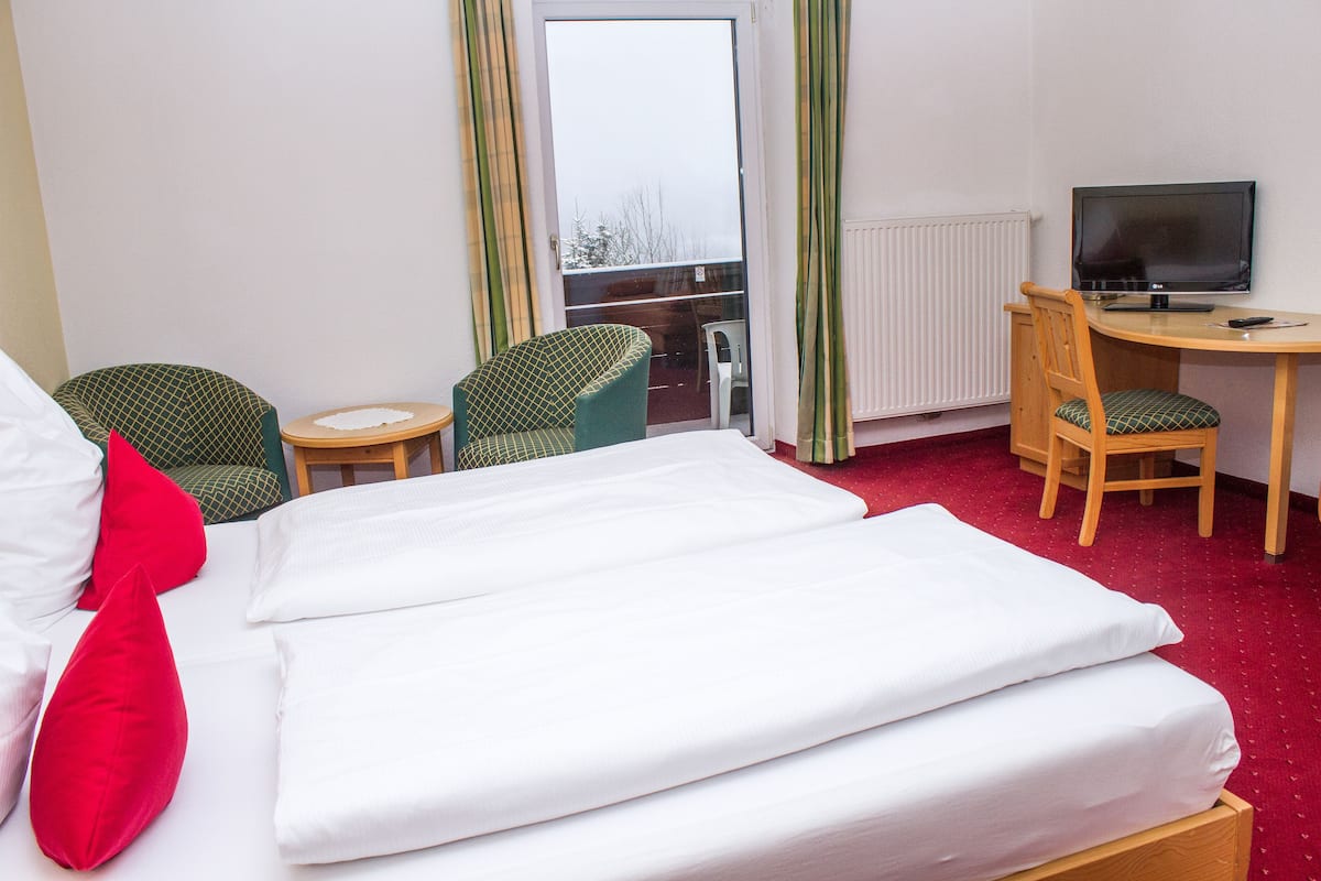 superior double room, balcony, view | hypo-allergenic bedding, minibar, in-room safe, blackout curtains