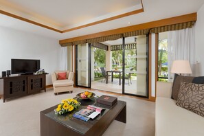 Two Bedroom Pool Villa | Living area | 33-inch LCD TV with cable channels, TV, DVD player